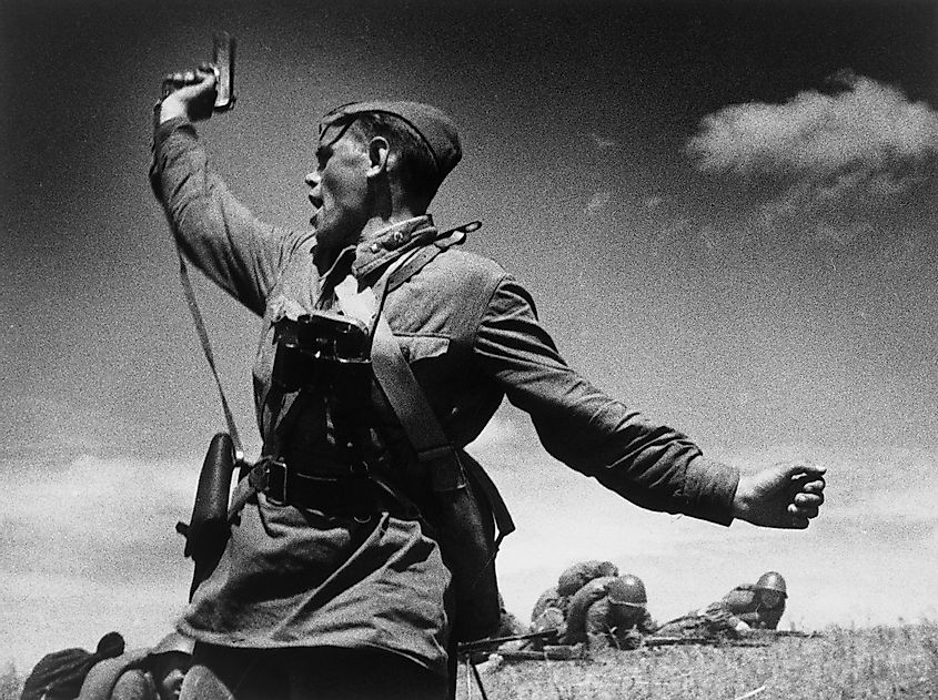 Iconic photo of a Soviet officer (thought to be Ukrainian Alexei Yeryomenko) leading his soldiers into battle against the invading German army, 12 July 1942, in Soviet Ukraine