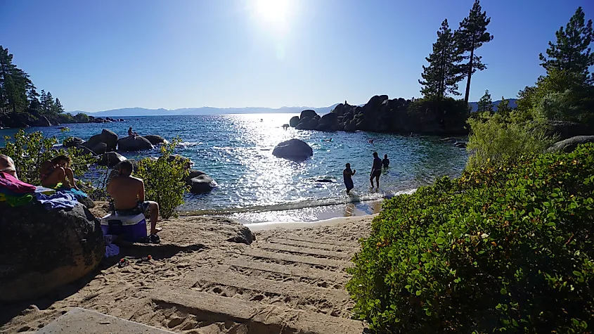 People enjoying the end of summer at the beach. Photo taken at Sand Harbor State Park in Lake Tahoe over the Labor Day weekend.