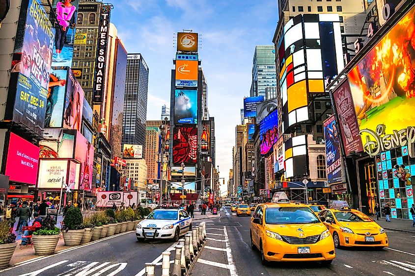  Times Square ,is a busy tourist intersection of neon art and commerce and is an iconic street of New York City