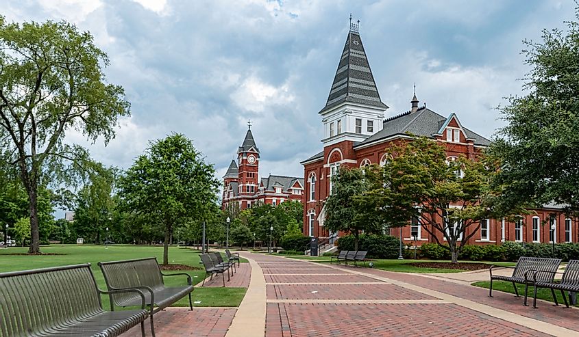 A scenic view looking down the walkway leading to Hargis Hall on the campus of Auburn University in the summer time.
