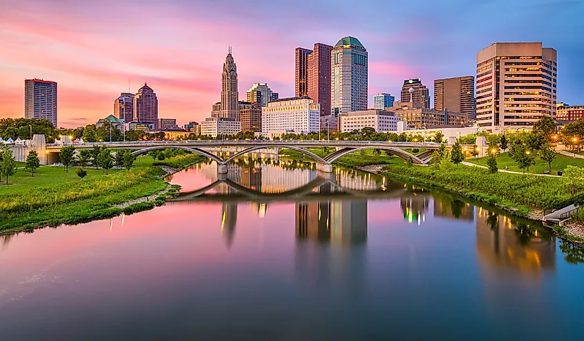 Columbus, Ohio, USA skyline on the river at dusk.