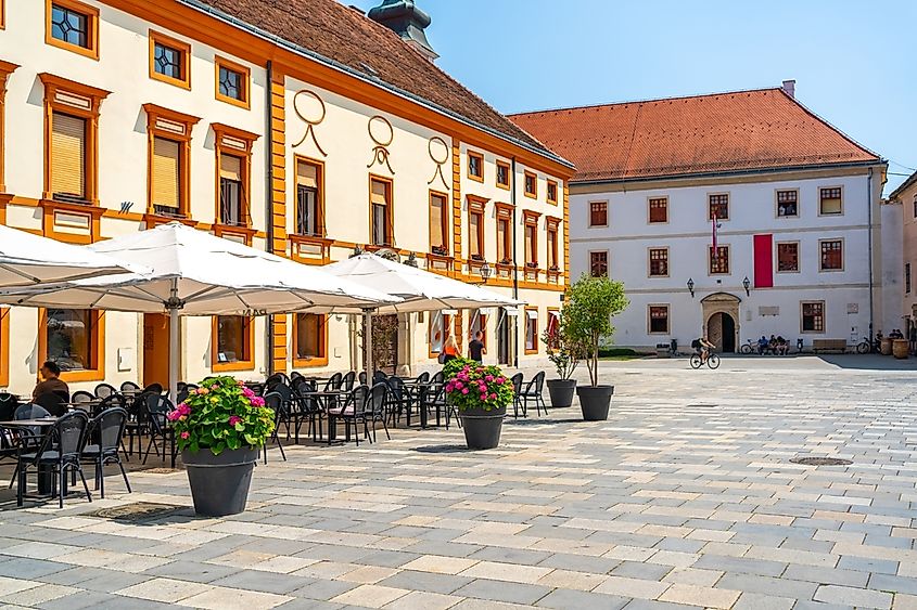 Town square in Varaždin with yellow-orange facades.