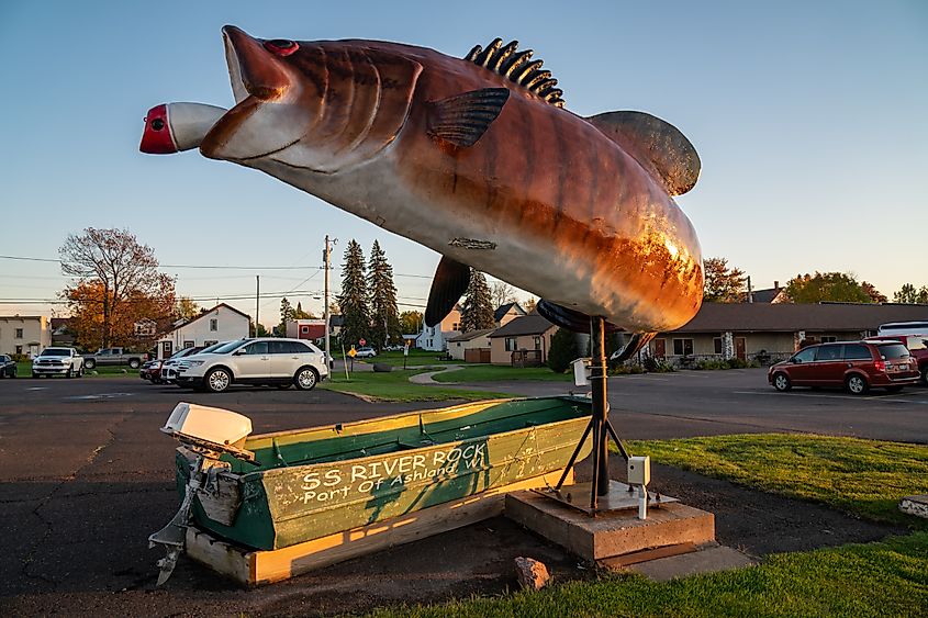 Ashland, Wisconsin - October 19, 2019: Famous large fish statue sculpture for the SS River Rock Port of Ashland