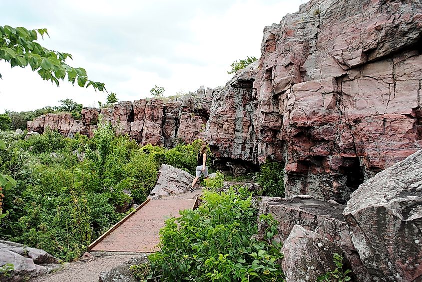 A hiker at the Pipestone National Monument