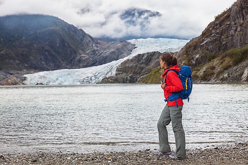 Tourists at the view point of Mendenhall Glacier and Lake in Juneau, Alaska, USA. Editorial credit: fon thachakul / Shutterstock.com