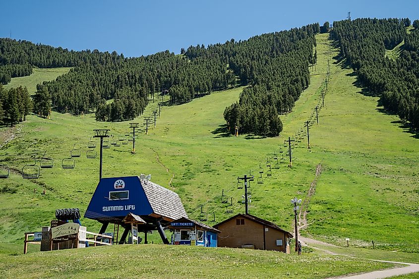 Snow King Ski Resort area in summer, with the summit lift chairlift operating for hikers