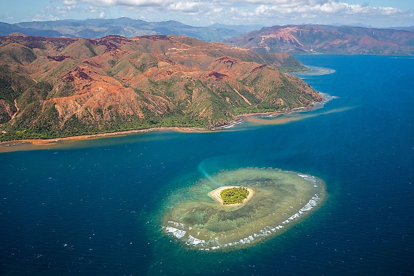 A small atoll islet with heart shaped coral reef off the east coast of Grande Terre island of New Caledonia, French overseas collectivity.