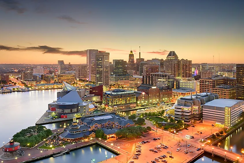 Baltimore, Maryland, USA inner harbor and downtown skyline at dusk.