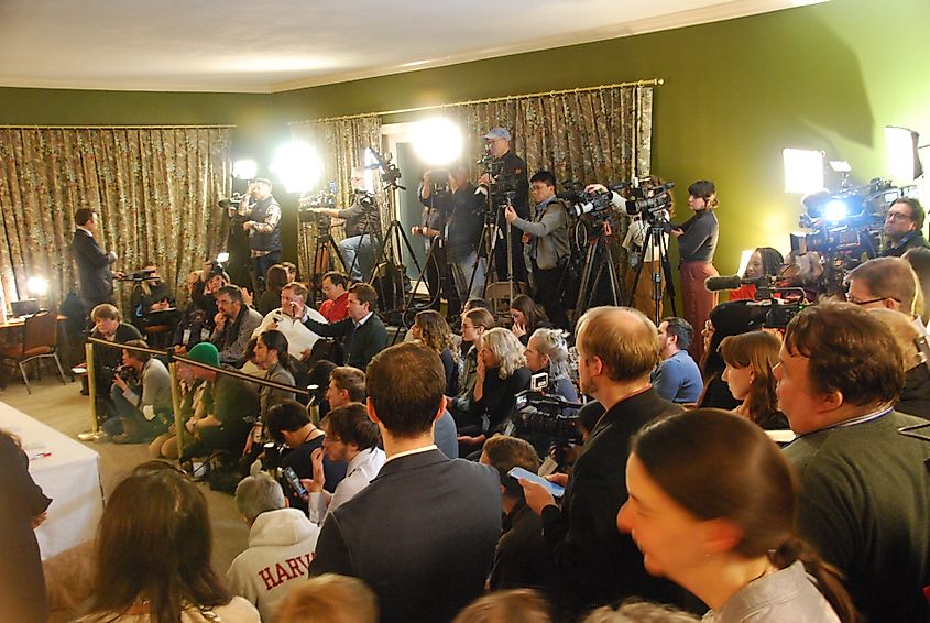 Members of the media wait for the voters of Dixville Notch to cast their midnight votes 