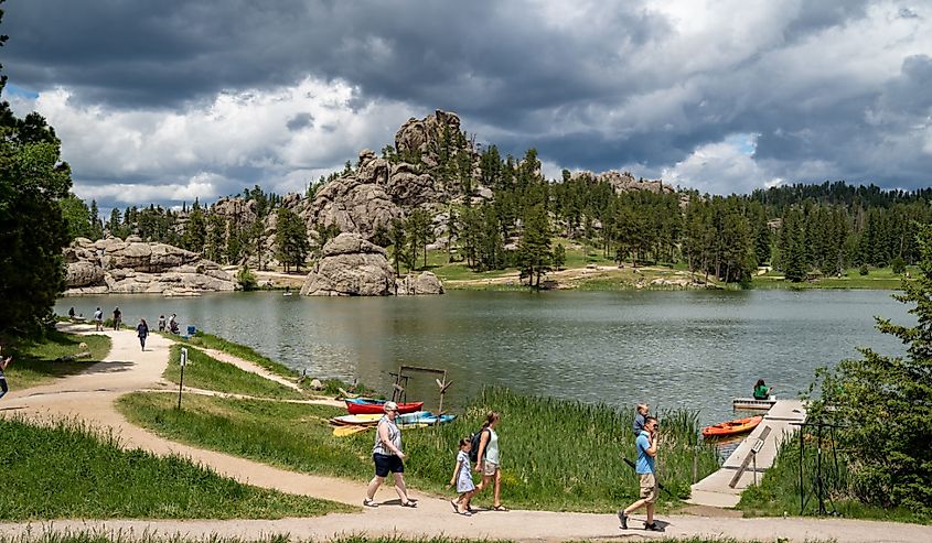 Families enjoy a summer day on Sylvan Lake, in Custer State Park