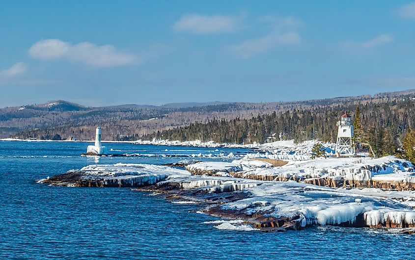 The Grand Marais Lighthouse on Lake Superior during winter