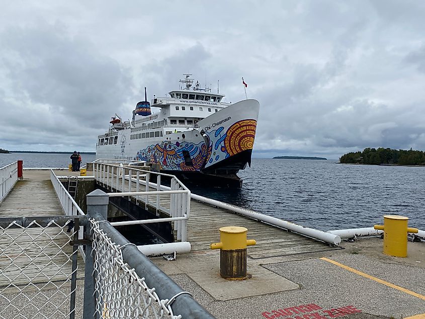 The Chi-Cheemaun passenger and car ferry makes it's final approach into dock at Tobermory Ontario.