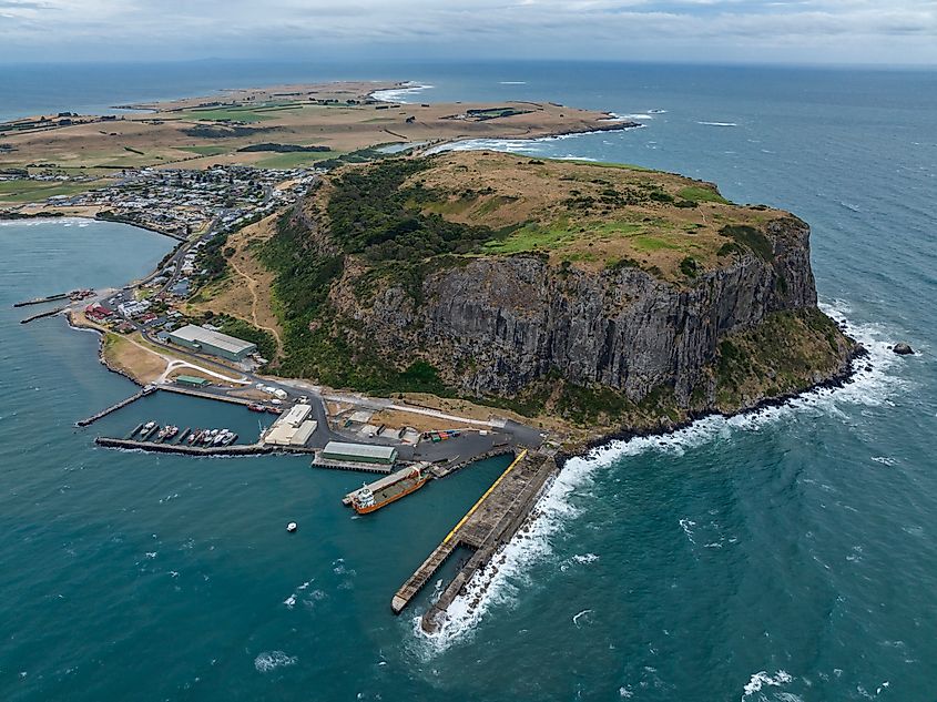 High angle aerial drone view of landmark the Nut, an extinct volcano table mountain.