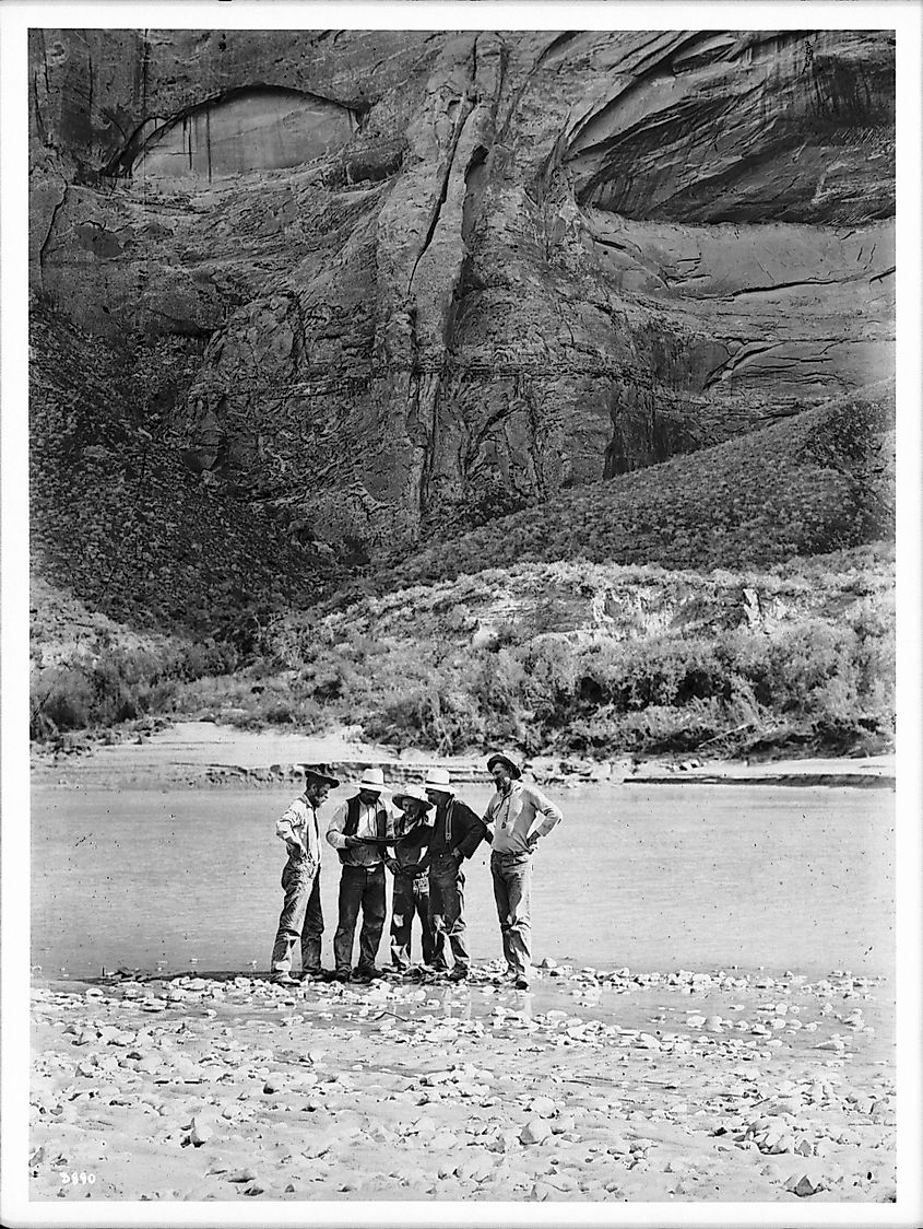 Prospectors along the Colorado River in Glen Canyon, circa 1900. Photograph by George Wharton James, via Wikimedia Commons. Public domain.