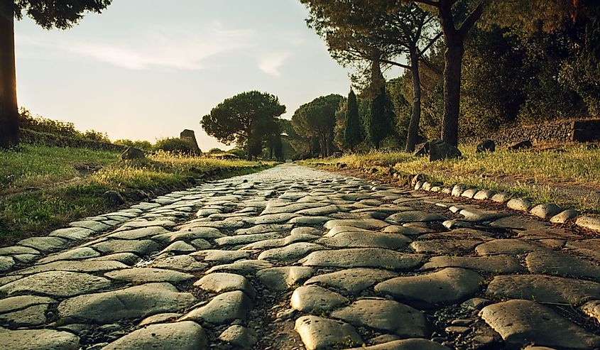 Antique road via Appia Antica in Rome, Italy.