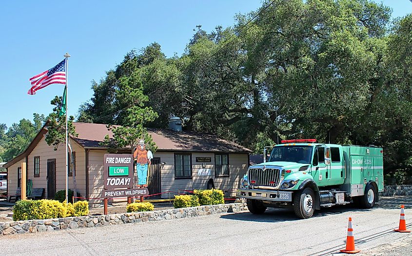 View of a firefighter rescue vehicle parked next to a firehouse in Trabuco Canyon California