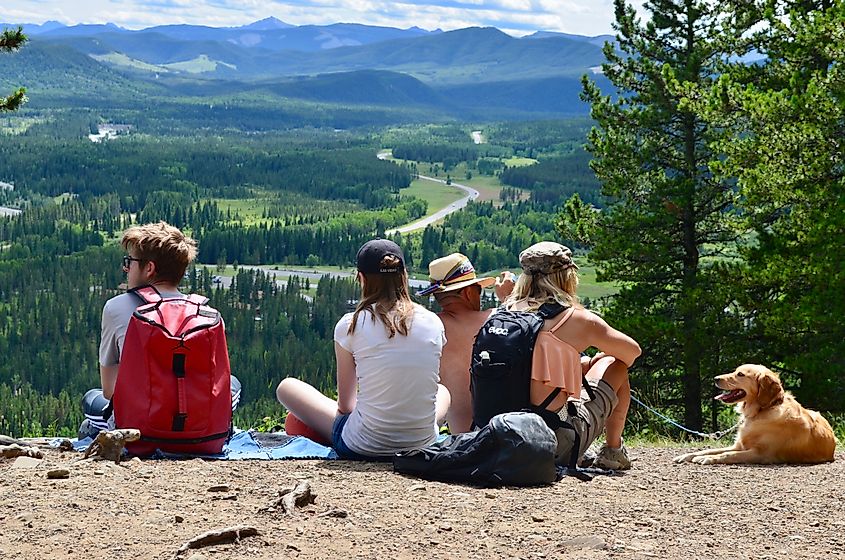 A family admiring the scenic view at Fullerton Loop Trail in Bragg Creek, Alberta