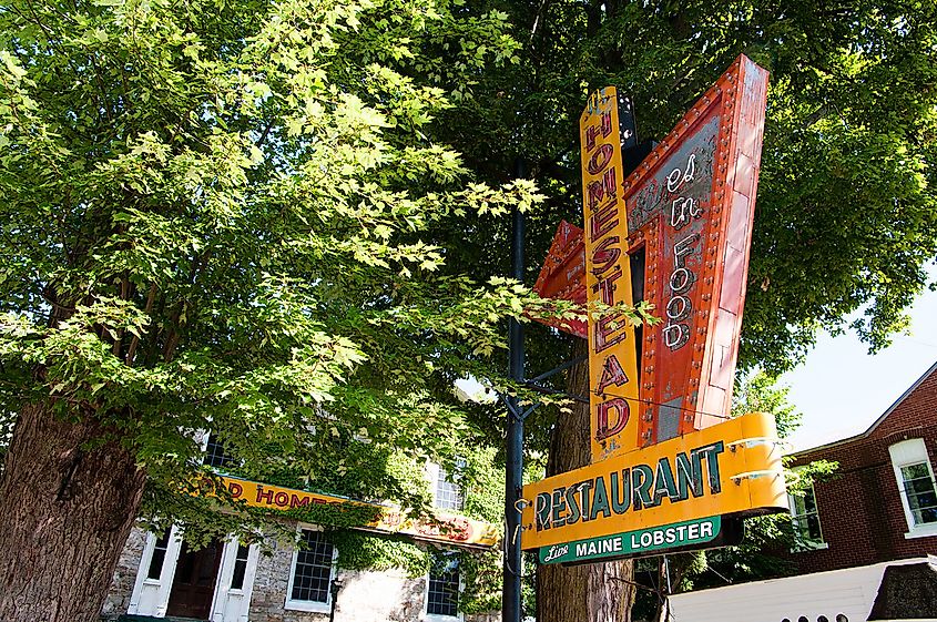 Old restaurant sign in Alexandria Bay, New York.
