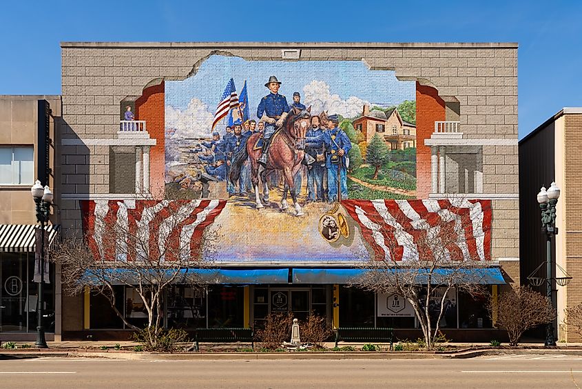 Exterior of downtown building with W.H.L. Wallace mural by artist G. Byron Peck in Ottawa, Illinois