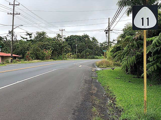 2021-10-09 12 04 51 View southwest along Hawaii State Route 11 (Volcano Road) at Hale Kula Road and Hawelu Road in Kurtistown, Hawaii County, Hawaii.jpg
