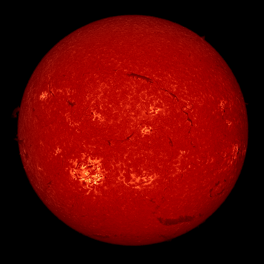 The Sun photographed in hydrogen-alpha light, showing surface texture and detail.