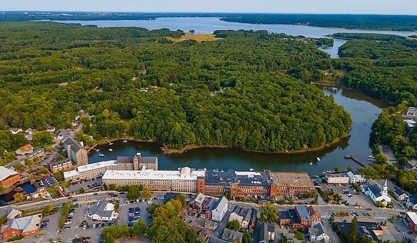 Newmarket Mills building aerial view on Lamprey River on Main Street in historic town center of Newmarket, New Hampshire