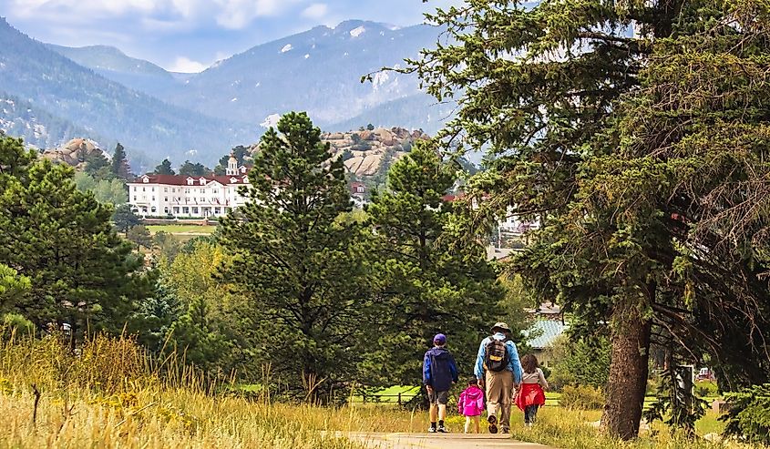 Family hiking near Estes Park, Colorado, in summer.