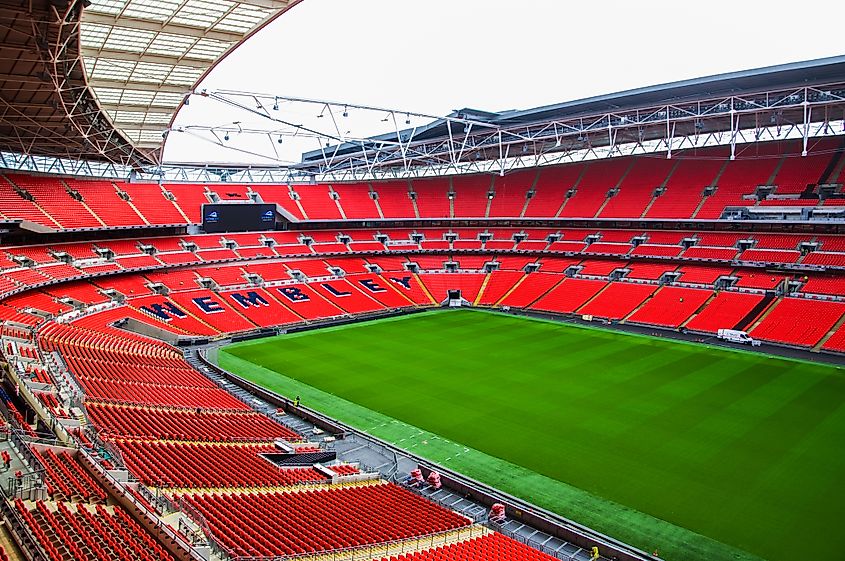 Red seat and interior of Wembley football stadium, London UK.