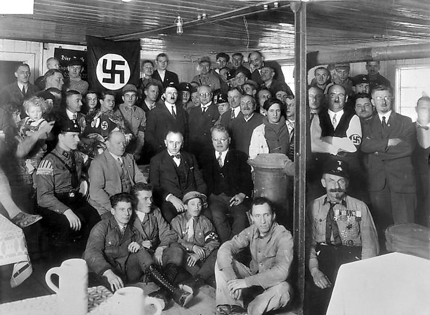 Hitler with Nazi Party members in 1930