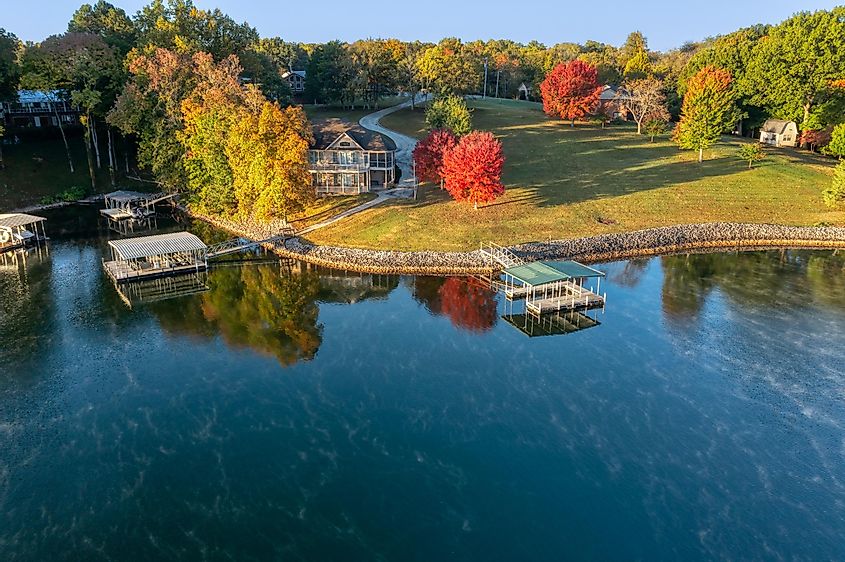 Aerial view of lake homes and boat houses on beautiful Tims Ford Lake in Winchester Tennessee.