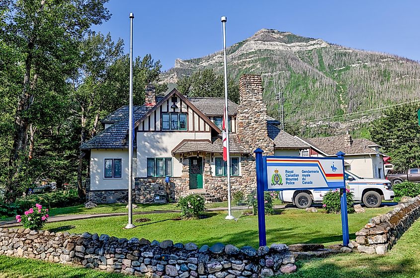 Waterton, Alberta - July 9, 2021: RCMP station in Waterton Alberta, via Todamo / Shutterstock.com