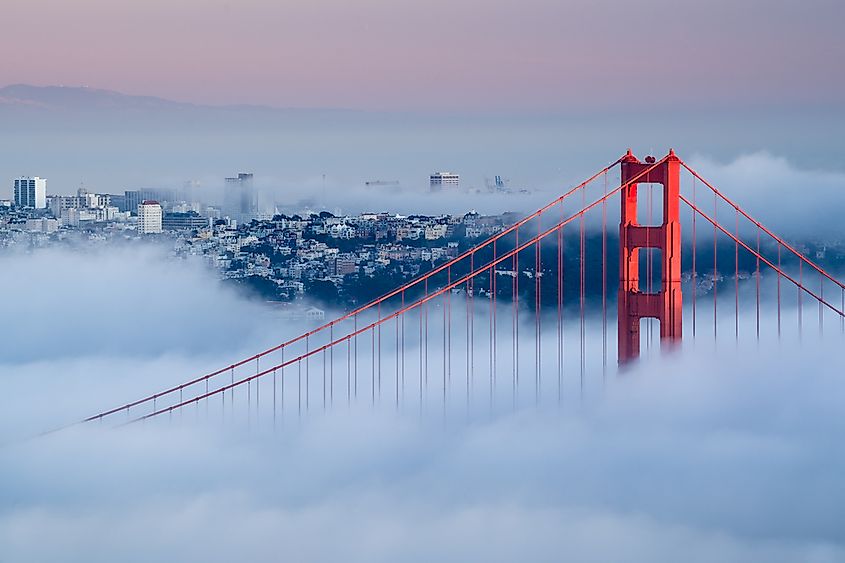 Fog rolling over the Golden Gate Bridge at the entrance to San Francisco Bay