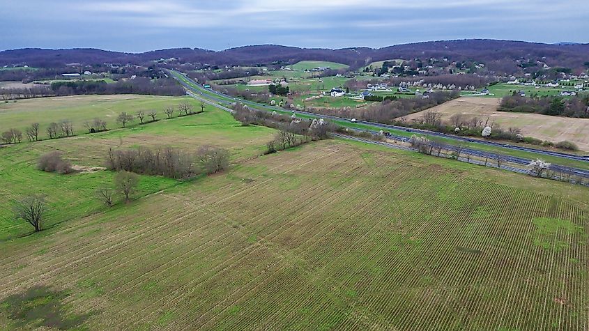 Rolling hills extending across western Frederick landscape. 