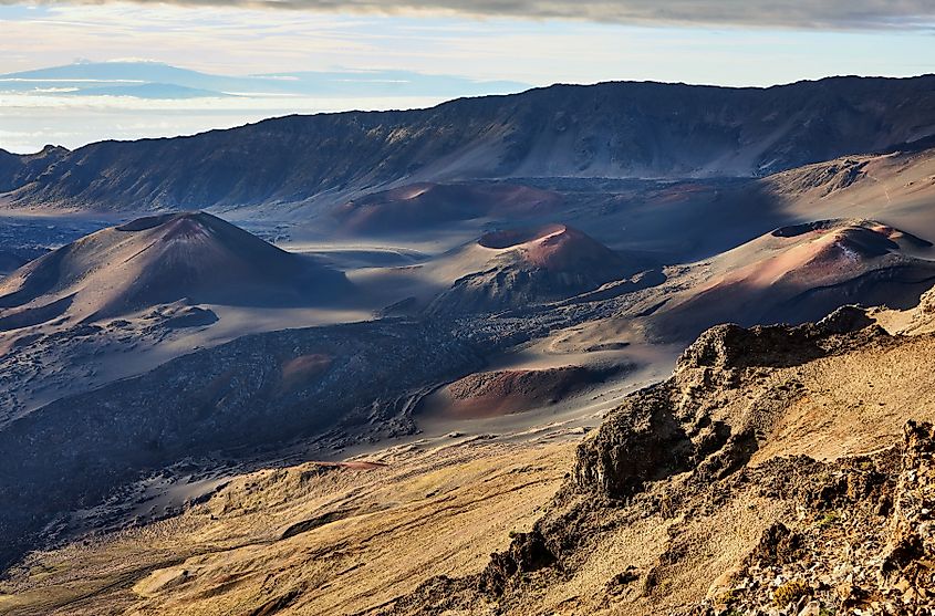 Haleakala crater, detailed view of multiple cinder cones in a volcanic desert landscape.