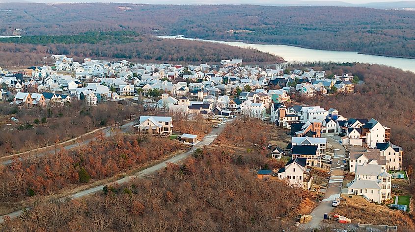 Aerial view of lakeside houses and homes in Carlton Landing, Oklahoma resort town on Eufaula Lake during sunset landscape