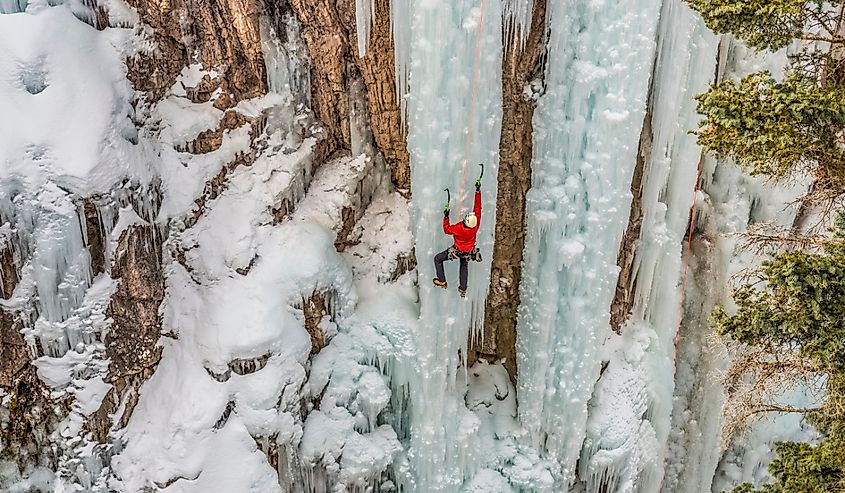 Ice climber ascending at Ouray Ice Park, Colorado