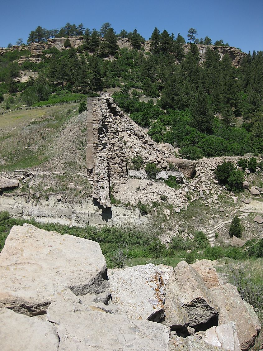 Looking west to the remains of Castlewood Dam from the remains of eastern end of the dam that burst in 1933 in Castlewood Canyon State Park, Colorado, U.S.A.