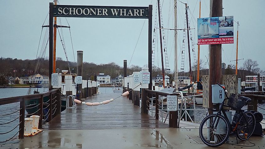 Wet wooden pier at Schooner Wharf in Mystic, Connecticut