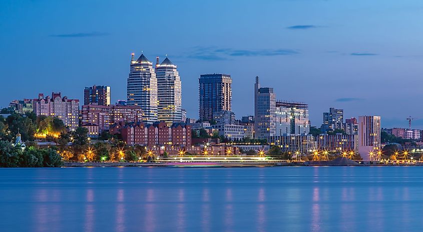 Panoramic view of the towers, skyscrapers, and promenade in the evening in Dnipro, Ukraine