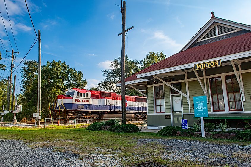 A Florida Gulf Atlantic Railroad train is seen passing the historical Milton depot.