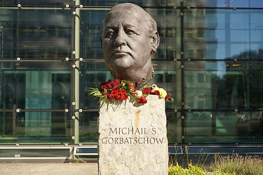 Bust of Mikhail Gorbachev decorated with flowers at Axel Springer building in Berlin, part of the Fathers of Unity monument