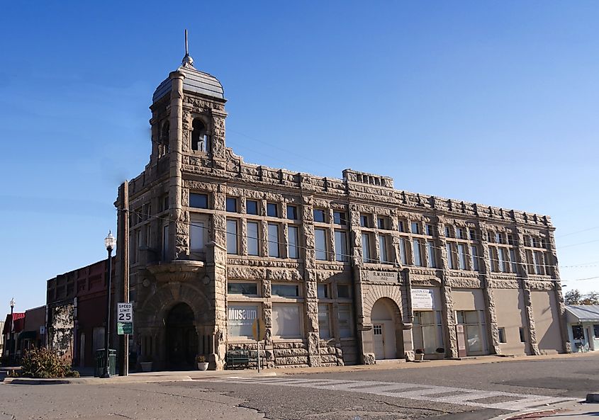 TISHOMINGO, OKLAHOMA—OCTOBER 2017:  Exterior of the Chickasaw Bank Museum building maintained by the Johnston Country Historical Society and listed in the National Register of Historic Places.