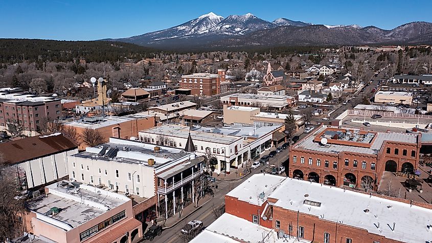 Downtown Flagstaff, Arizona, with snow on the buildings.