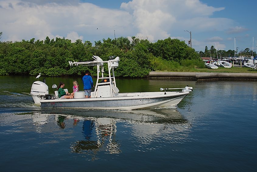 A family enjoying a cosy time in a boat in Gulfport, Florida.