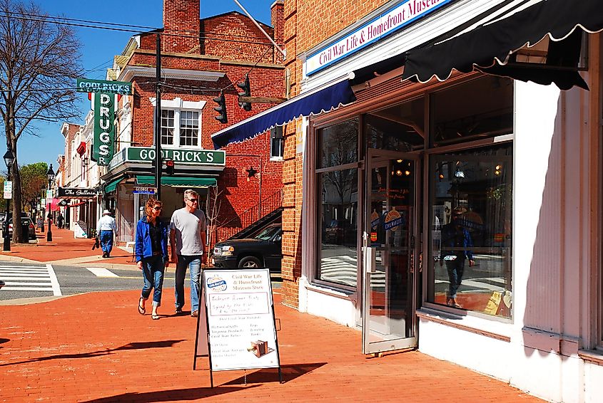couple walks through charming Fredericksburg, Virginia. Editorial credit: James Kirkikis / Shutterstock.com