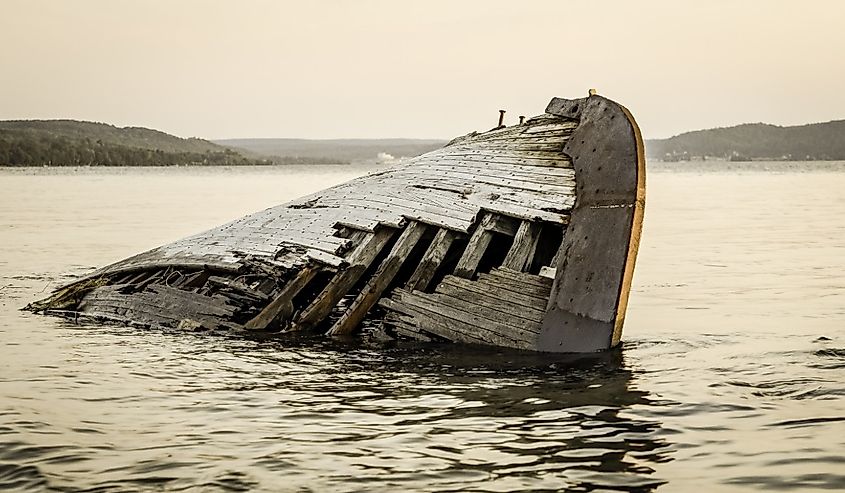 Ghostly wooden shipwreck washed up on the remote shores of Lake Superior. Pictured Rocks National Lakeshore. Munising, Michigan.