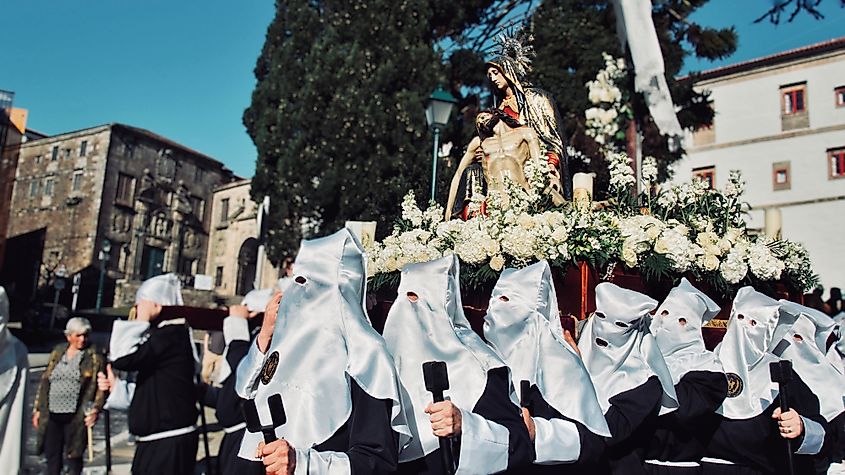 Traditional costumes during the Easter celebrations in Santiago de Compostela, Spain By Валерия Мягкая