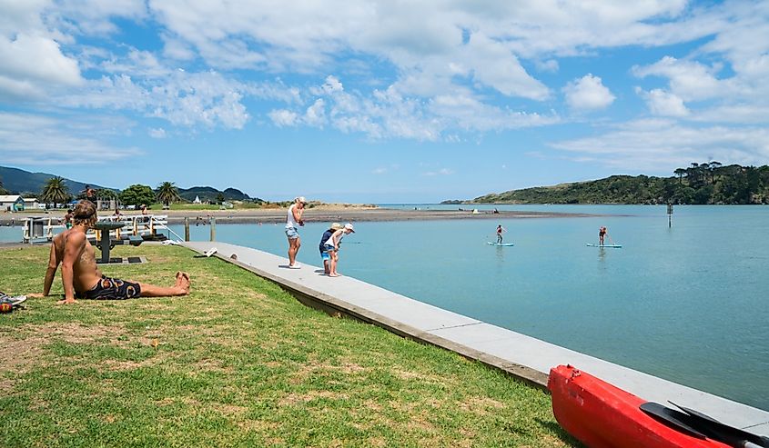 Summer fun along the beach in Raglan, New Zealand