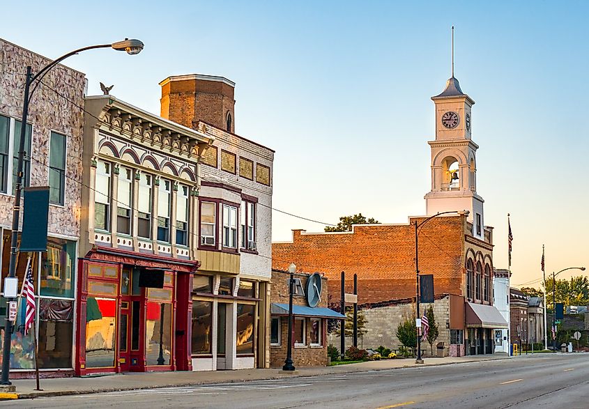 Main street of rural small town in midwest USA with storefronts and clock tower, Paxton