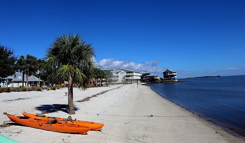 Island city of Cedar Key off the northwest coast of Florida with kayaks on the shore